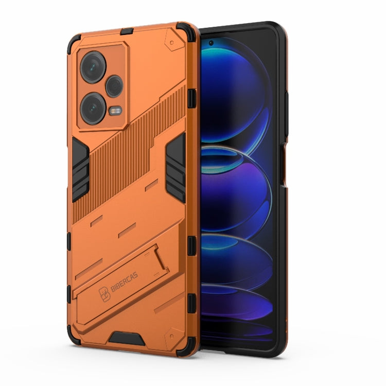 For Xiaomi Redmi Note 12 Pro+ China Punk Armor 2 in 1 PC + TPU Phone Case with Invisible Holder(Orange)